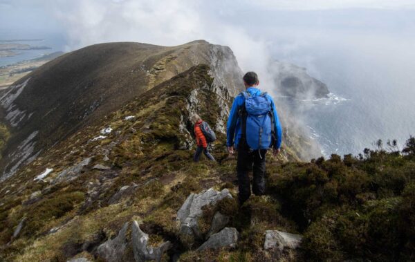 Northwest-Adventure-Tours-Hiking-1-600x379 tourists walking on a mountain trail custom guided hike
